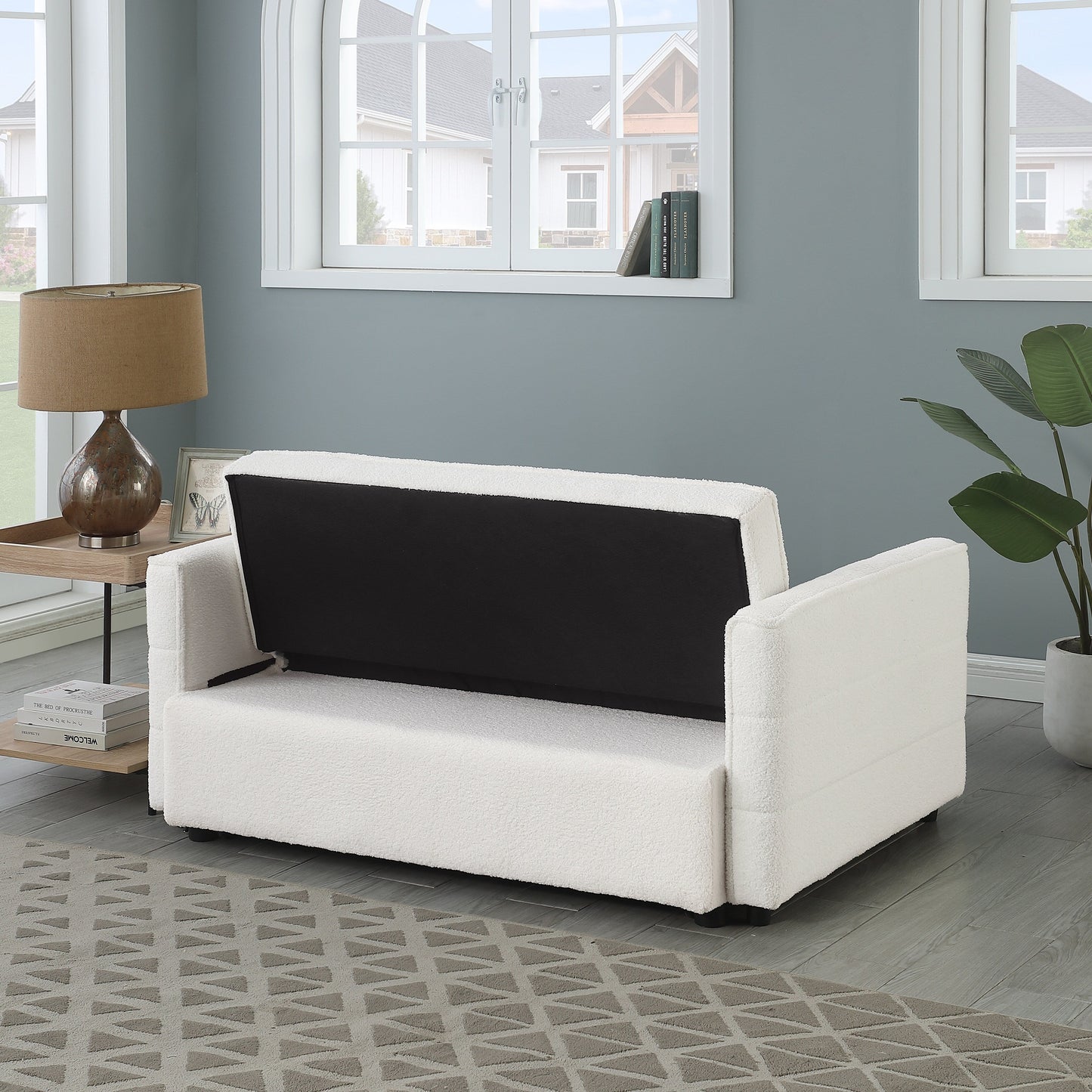 Canapé-lit convertible beige 55.12 en bouclette, avec dossier réglable et 2 coussins lombaires pour le salon.