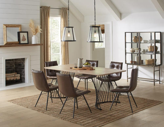 Table à manger Altus avec pied tourbillonnant, chêne naturel et métal noir.