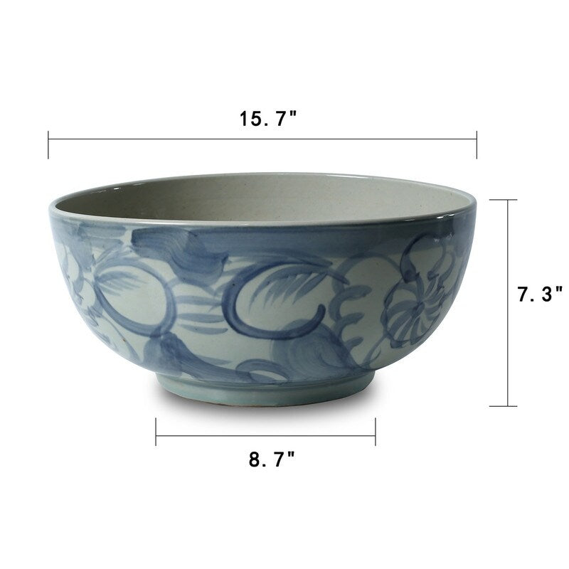 Bol bleu et blanc avec motif floral, env. 16 cm de diamètre.