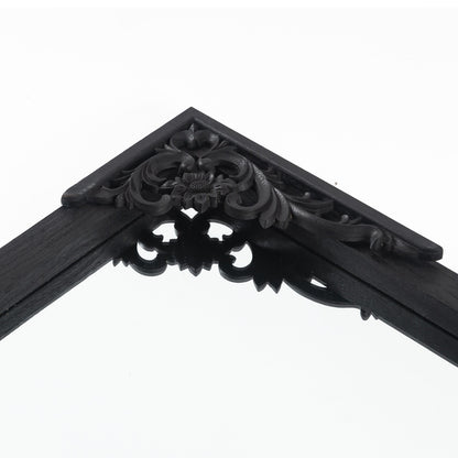 Grand miroir de sol en bois massif à encadrement incurvé et sculpture