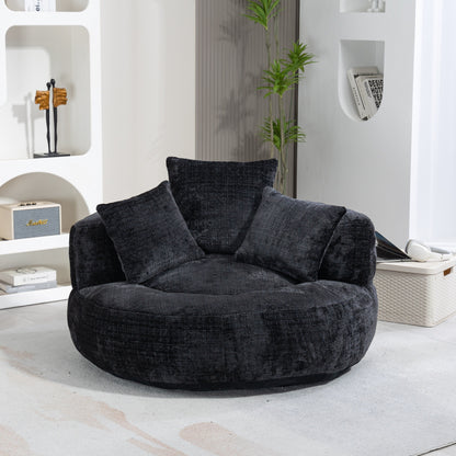 Canapé pouf géant noir en chenille 42.52, pour chambre à coucher, avec trois coussins.