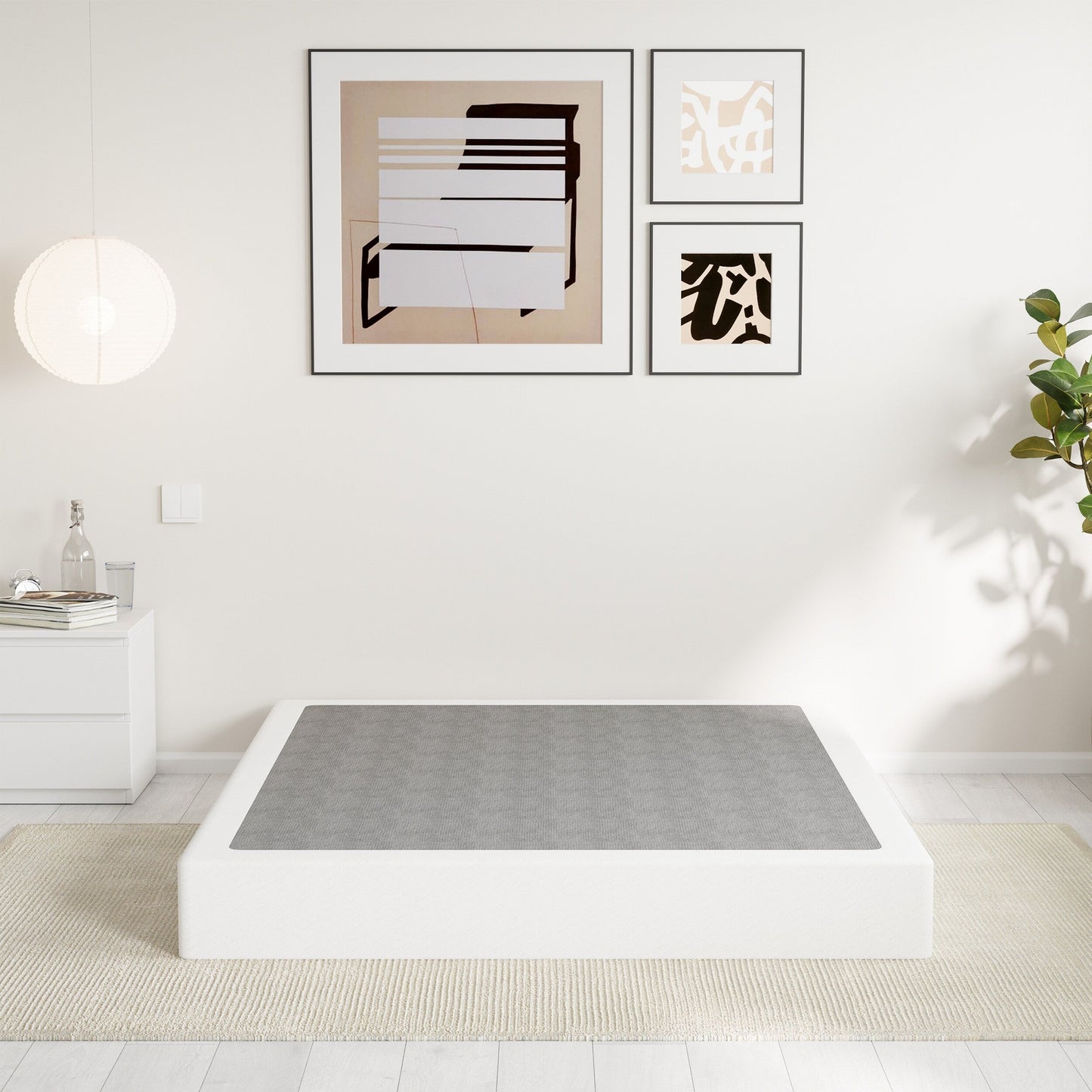 Ressort métallique à profil bas de 5 pouces, structure robuste avec revêtement gris.