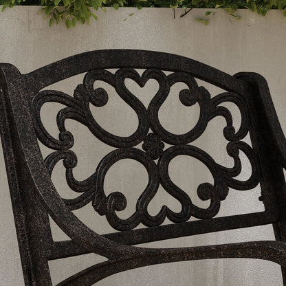 Ensemble de repas d'extérieur Sanibel en aluminium bronze, 7 pièces, comprenant une table ovale de 72 pouces et six chaises à accoudoirs de Homestyles.