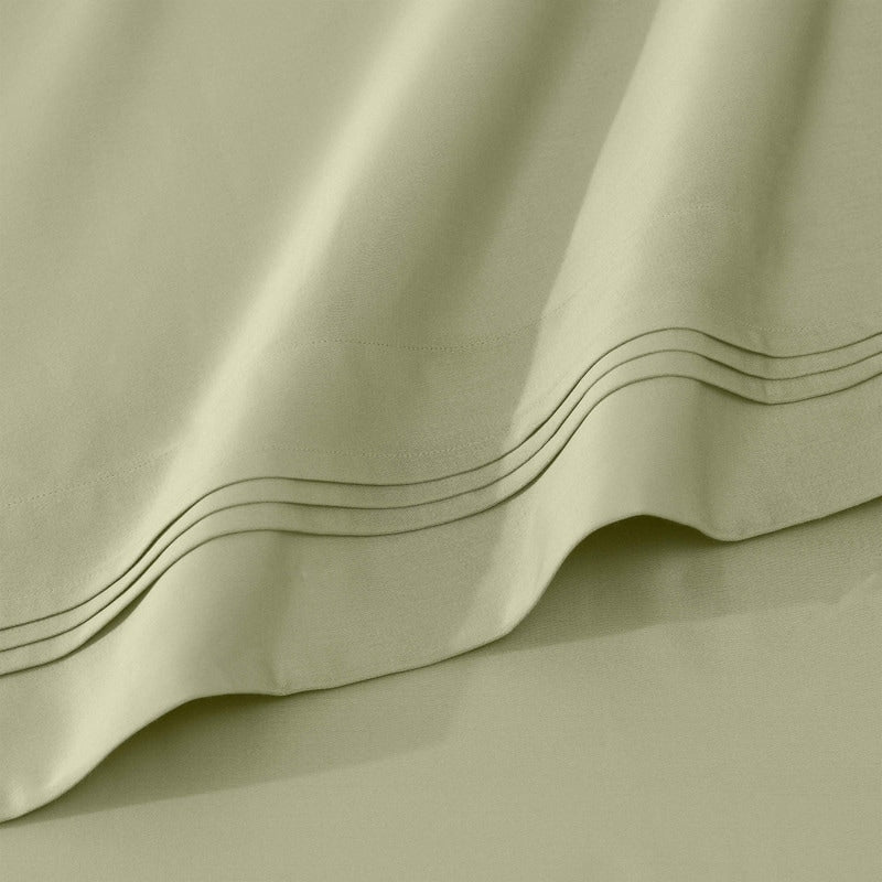 Jeu de draps uni en coton égyptien supérieur, 1000 fils, avec poche profonde.