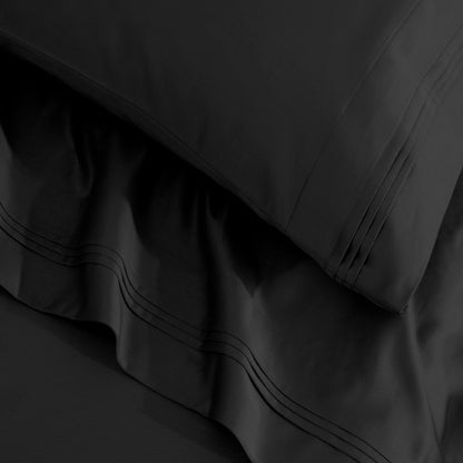 Jeu de draps uni en coton égyptien supérieur, 1500 fils, avec poche profonde.